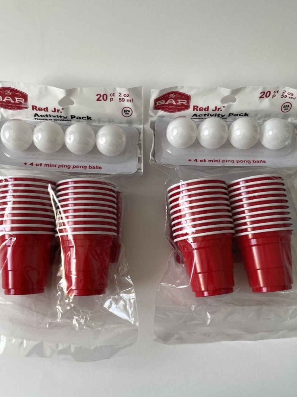 Brand-new set of 2 Red Jr. Activity Packs. Each pack includes: 20 mini red cups